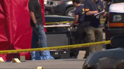 FBI agents investigate the scene in Biddeford, Maine where a man died after an encounter with immigration officials