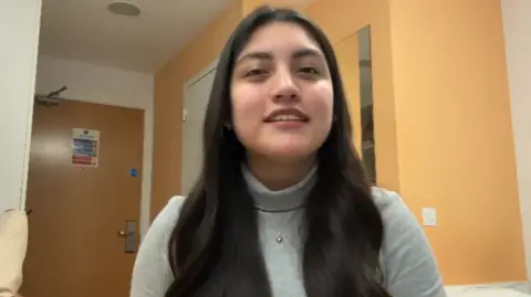 A woman with long dark hair