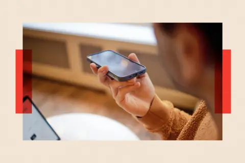 Getty Images A close-up of a person using a smartphone for voice recording