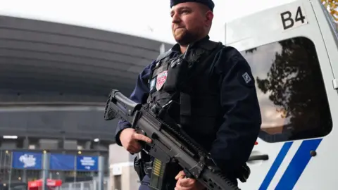 FRANCK FIFE/AFP A French riot policeman guards the Stade-de-France stadium ahead of Thursday's UEFA Nations League soccer match between France and Israel