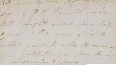An old handwritten letter that says "worn out after you saw me that I almost wish'd that I might never see a Lady again and the name of fossils makes me sick with its concominants, Gratefully yours Mary Anning" and a note beneath saying: "The celebrated Lyme Regis geologist".