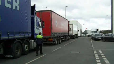 Richard Sweetman Lorries queuing at DHL Rugby depot