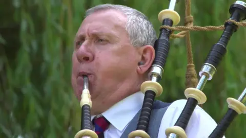 BBC Man playing bagpipes