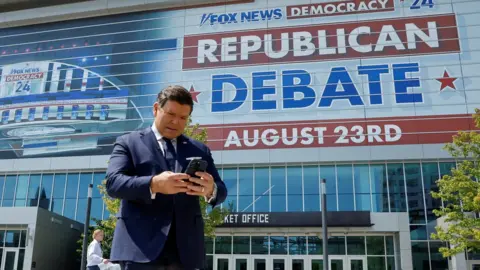 Reuters Debate moderator Bret Baier outside of debate arena