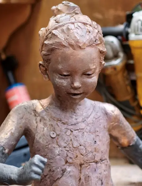 Graham Ibbeson Little girl bronze casting of Graham Ibbeson sculpture