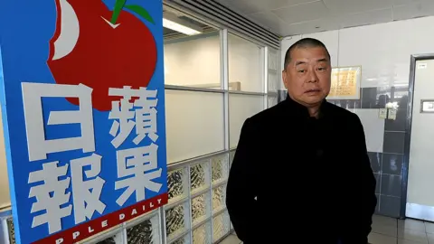 Getty Images This photo taken on February 7, 2011 shows Hong Kong media tycoon Jimmy Lai outside his company's headquarters in Hong Kong. Lai,