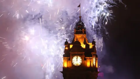 PA Fireworks over Edinburgh Castle during Hogmanay