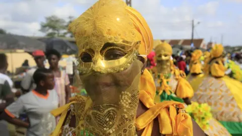 EPA Ivorians take part in a parade on the last day of the 38th Popo Carnival in Bonoua, 60km south of Abidjan, Ivory Coast, 14 April 2018. The carnival of Bonoua is the Ivoirians version of Mardi Gras running for a week. Derived from at first a celebration of the cultural heritage of the Aboure people, the Popo Carnival involves gastronomic competitions, Miss pageants, sports days, a festival of traditional dances and reflection workshops on Popo museum amongst other activities.