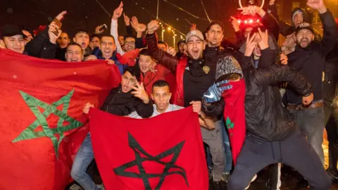 EPA a large group of men with flags
