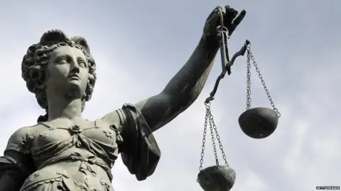Getty Images Scales of Justice
