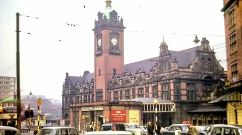 Bryan Jeyes External shot of Victoria Station's clock tower and booking hall, 1966
