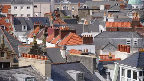 BBC A view of numerous rooftops in Guernsey town centre