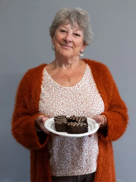 Jim Grover Lynn Vickery with her chocolate brownies