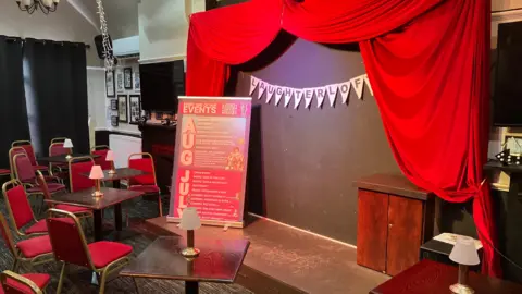 A stage in a pub