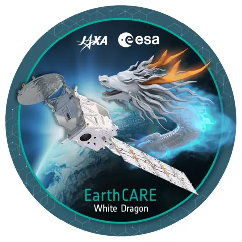 The Esa mission patch displays Jaxa's white dragon logo