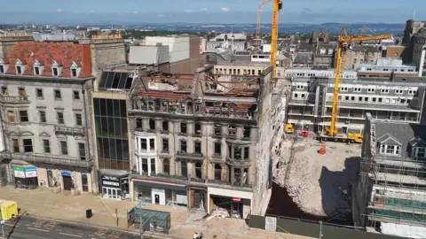 An aerial shot of the former Debenhams store on Princes Street in Edinburgh following a fire
