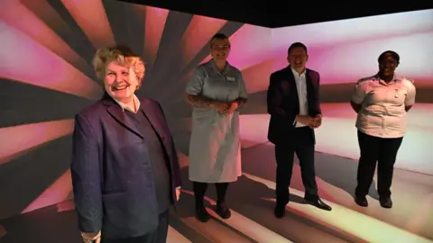 ARU Peterborough Sandi Toksvig along with Ross Renton and members of the ARU at the official opening looking happy 