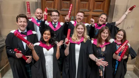 Douglas Robertson Graduates celebrating