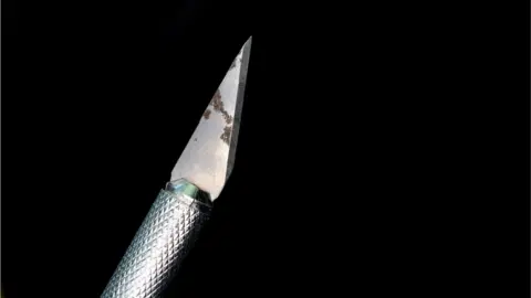 Getty Images dirty scalpel