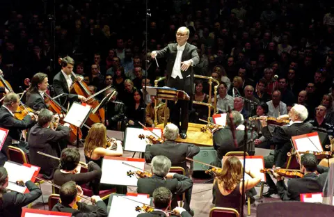 Getty Images Ennio Morricone conducts at the Royal Albert Hall