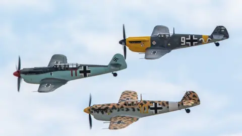 IWM Duxford Three Buchons painted as Messerschmitts