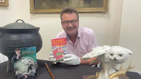 Richard Winterton Auctioneers Richard Winterton and Harry Potter book