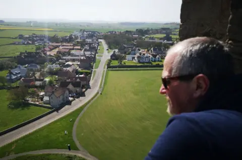 Bamburgh Castle Andrew Heely looks over the village of Bamburgh