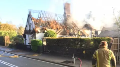 Luke Deal/BBC Thatched property after fire in Hengrave