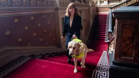 BBC Victoria Harrison and guide dog, Otto, at the Foreign, Commonwealth & Development Office