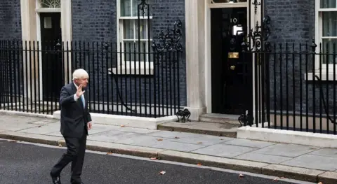 Reuters Boris Johnson waves goodbye