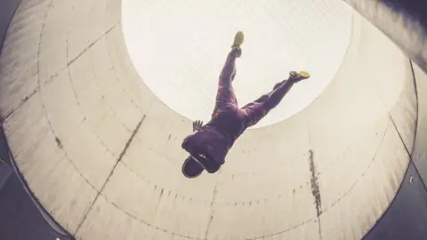 Getty Images Stock image of person indoor skydiving