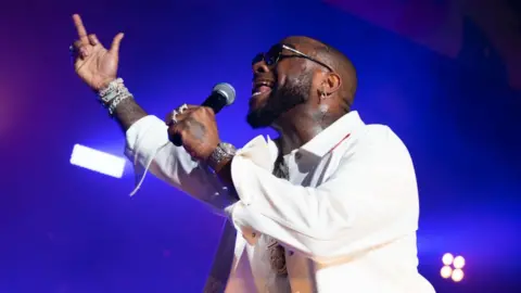 Getty Images Davido performs during YAM Carnival 2021 at Clapham Common