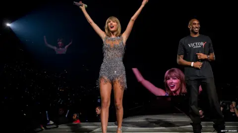 Getty Images Taylor Swift and Los Angeles Lakers basketball player Kobe Bryant.