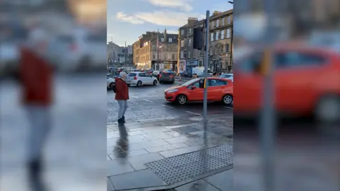 Cars at junction in Edinburgh