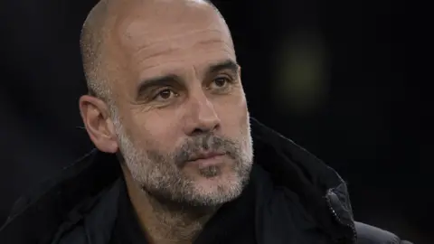 Manchester City boss Pep Guardiola on the touchline