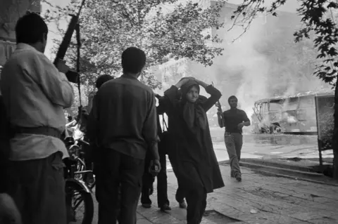 Getty Images Members of the MEK being rounded up in Tehran in 1982