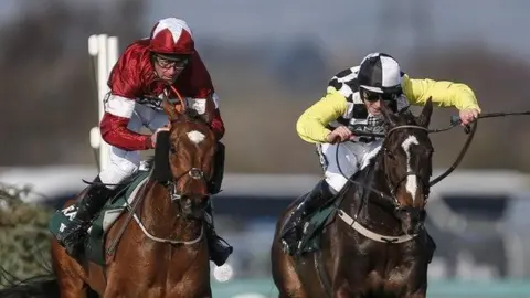 BBC Davy Russell (left) claimed his first Grand National win on Saturday