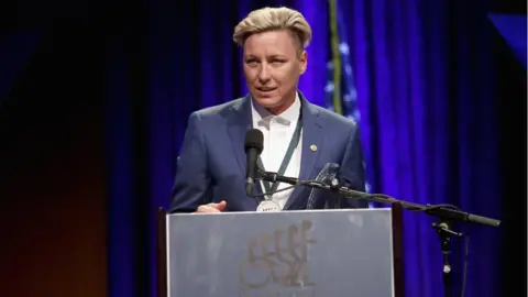 Thos Robinson/GETTY IMAGES Abby Wambach speaks onstage at a charity event, September 2017