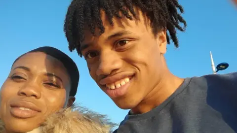 FAMILY PHOTO David Ejimofor and his mum Maria