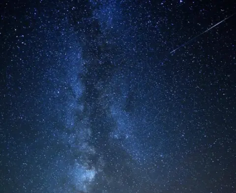 Bruce Frank The Milky Way with the trail of a meteor or "shooting star"