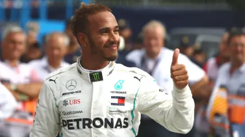 Getty Images Lewis Hamilton gives a thumbs up