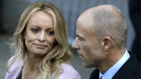 EPA Stormy Daniels (Stephanie Clifford) speaks to the press, as her attorney Michael Avenatti looks on, outside of federal court in New York City, New York, USA, 16 April 2018