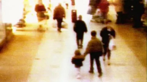 PA CCTV images of James Bulger being led away