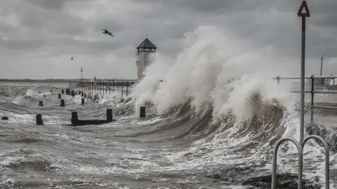 Colm O Laoi Waves crashing due to storm Francis at Brightlingsea, Essex