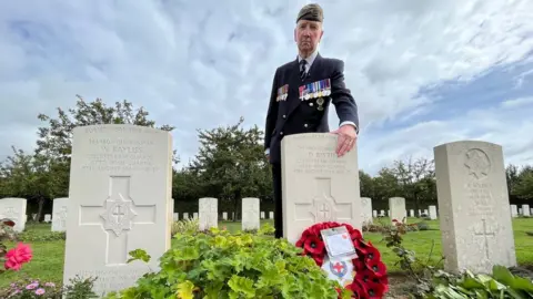 BBC Peter Blyth at the grave of his father Guardsman David Blyth