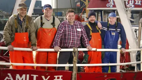 Crew of the trawler, Amity Left to right Nikolajs Afanasenko (Motor man), Kevin O"Donnell (Mate), Skipper Jim Buchan, Viktor and Douglas Cruickshank (Cook)