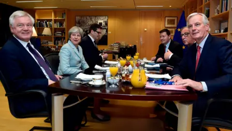 AFP David Davis, Theresa May, Jean-Claude Juncker and Michel Barnier meet at the European Commission in Brussels