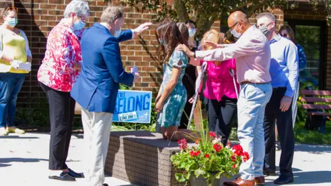 4Memories/Leon Rebodos Lindsay Rebodos at her Christian confirmation ceremony