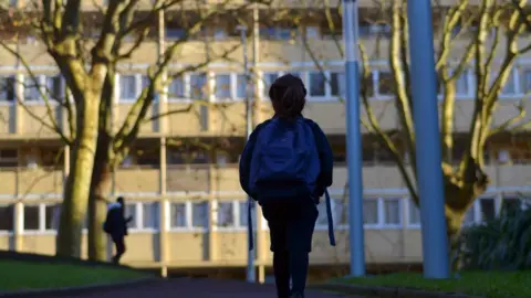 Getty Images girl-walks-alone