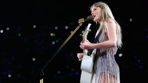 Taylor Swift performs onstage during "Taylor Swift | The Eras Tour" at Estadio Olimpico Nilton Santos on November 17, 2023 in Rio de Janeiro, Rio de Janeiro